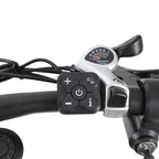 Close-up of a bicycle handlebar control panel with Shimano logo